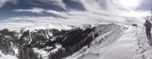 Hiking the Taos Ridge at Taos SkI Valley. Kachina Peak center right and round, ready to be skied. Wheeler Peak, center left in the back range, looking beautiful. Photo by Andrew Gatewood.